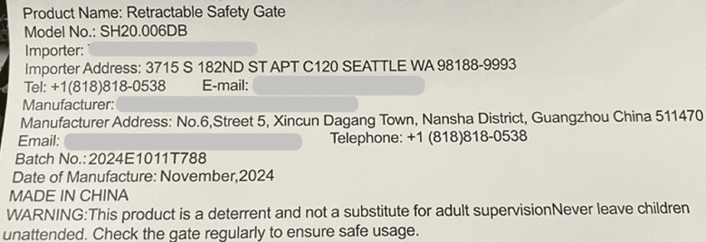 "Retractable Safety Gate" and model number "SH20.006DB" are printed on a white label stitched to the mesh fabric of the recalled safety gate