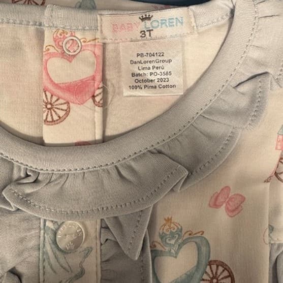 The Baby Loren logo and the size are printed on a sewn-in neck label