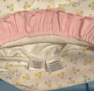 "October 2022" or "October 2023" are printed on a sewn-in seam label