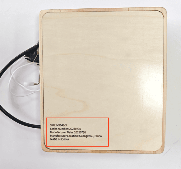 "SKU: MX049-3" and "Series no.20250730" are printed on the underside of the recalled Joyreal Busy Board toy