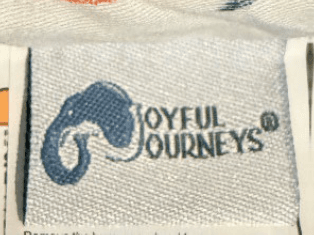 "Joyful Journeys" can be found on a tag stitched on the outside of the lounger cover