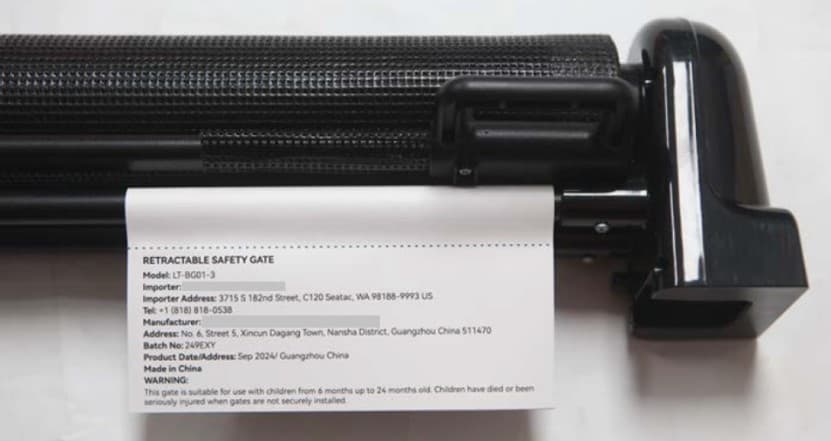 Model number printed on a white label on the side post of the recalled gate