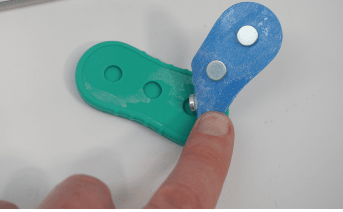 Recalled BUSOHA Magnetic Fidget Slider Toy with silicone casing removed, exposing magnets