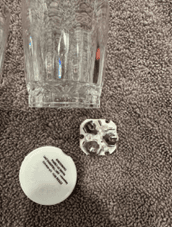 The recalled shot glasses have three batteries in a compartment in the underside of the glasses